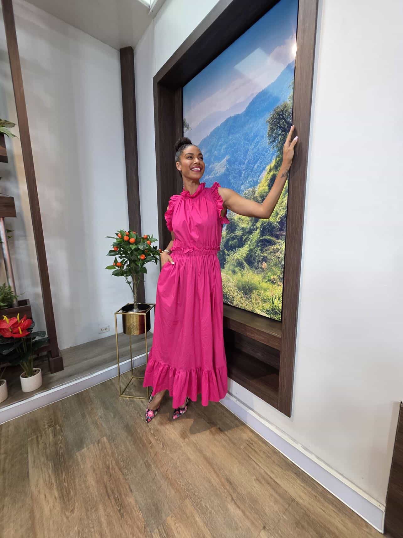 Fuchsia high-neck maxi dress with ruffle-trim flutter sleeves and tiered ruffle hem